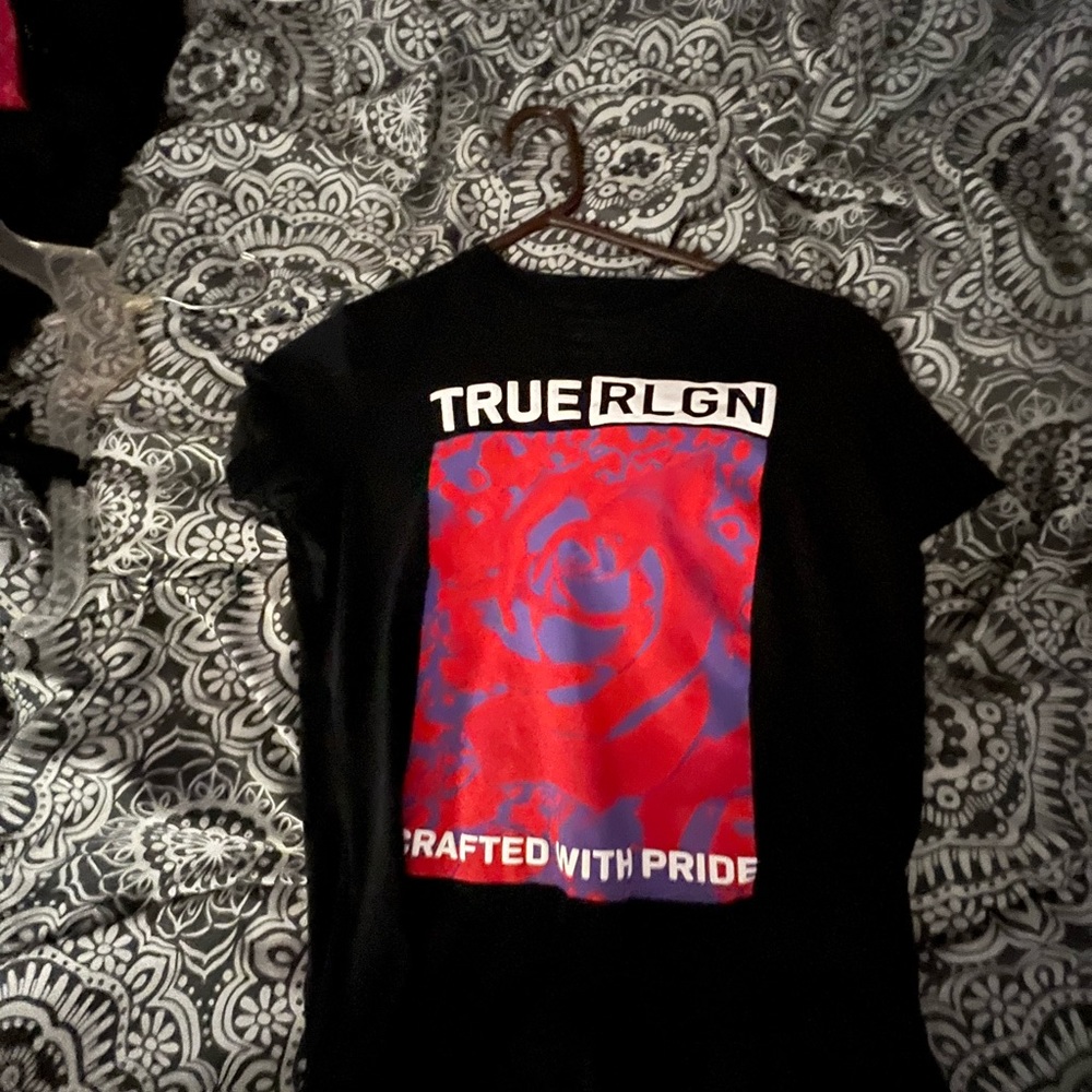 Selling true religon shirt they are medium sized.